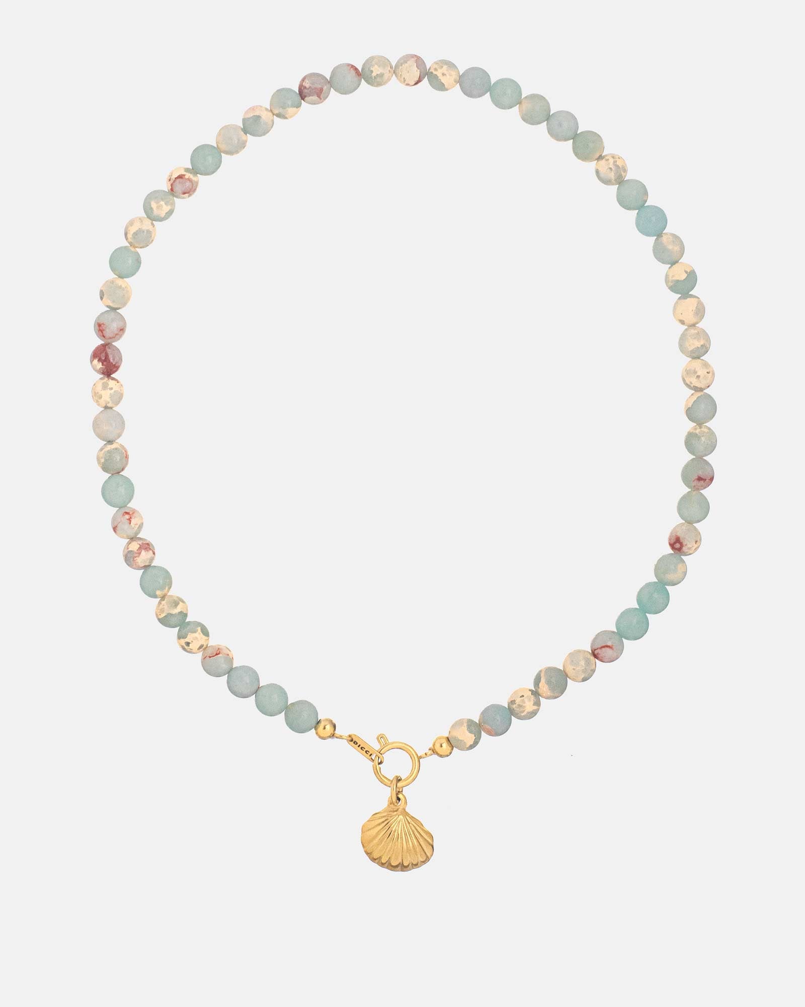 paradiso necklace with natural stones and a sea shell in golden steel