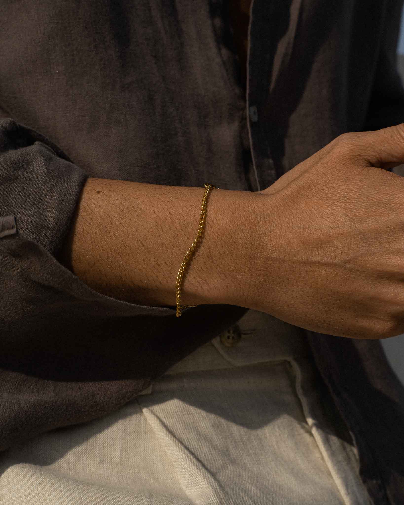 pulseira milano em aço dourado