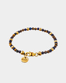 Navagio - Pulsera de piedra natural Navagio - Piedras de lapislázuli y ojo de tigre con detalles dorados en acero inoxidable - Pulseras de piedra natural - Joyería Unisex Online - Dicci