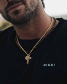 Golden Steel Necklace 'Benediction' on the models neck - Men women Necklaces - Online Jewelry - Dicci