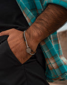 St. Benedicts Steel Bracelet on the models wrist - Online Unissex Accessories - Dicci